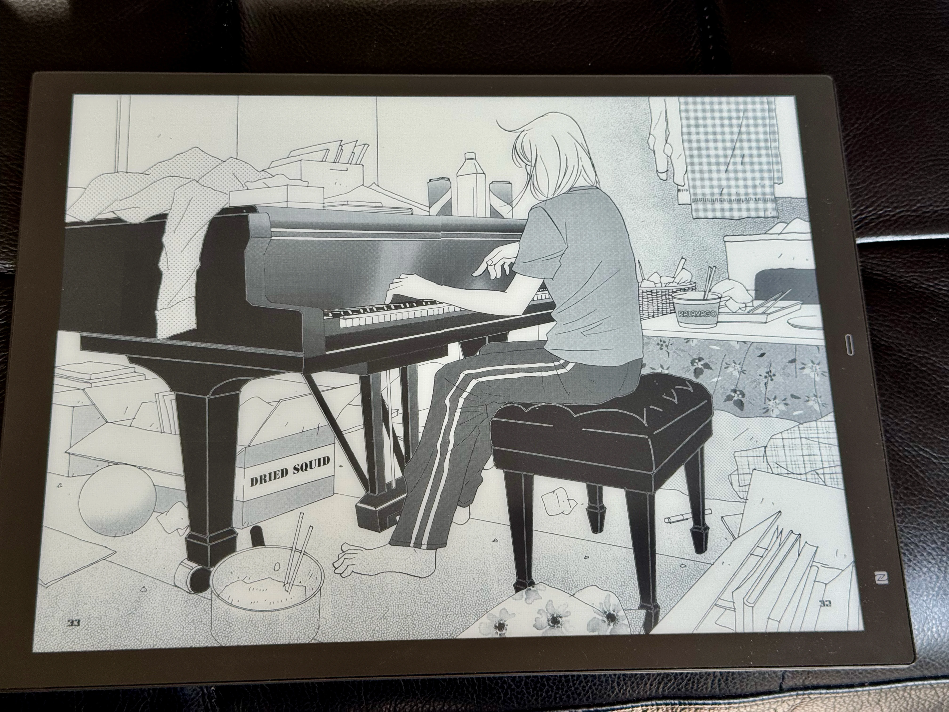 A Sony DPT-RP1 displaying a full manga spread