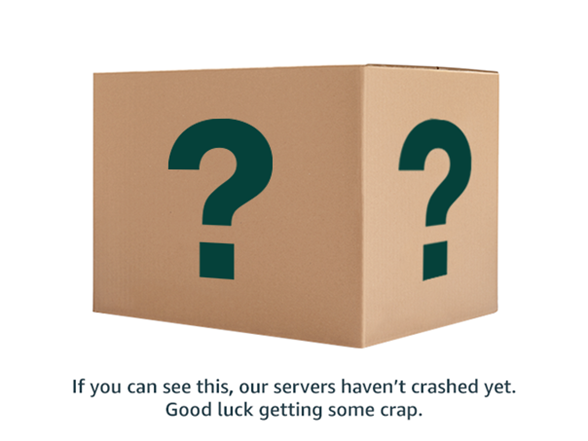 A tan cardboard box with dark green question marks on two sides